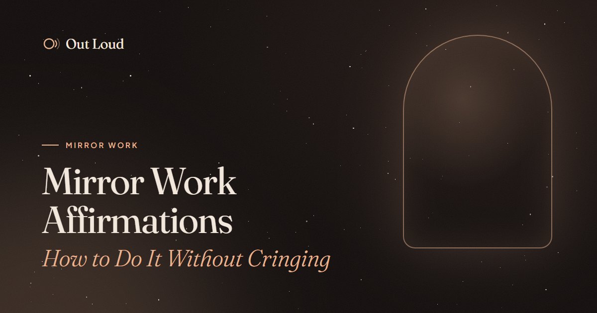 A dim mirror catching warm light, with the words: mirror work affirmations